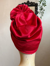 Load image into Gallery viewer, Mannequin head wearing a red velvet turban with a neutral background