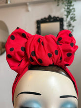 Load image into Gallery viewer, Mannequin head wearing a red polka dot turban with a neutral background