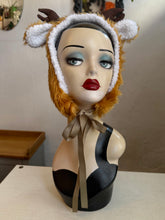 Load image into Gallery viewer, Fawn headpiece. Mannequin head with a deer-like costume in a decorative setting with mushrooms and plants.