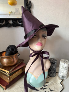 Purple Halloween witch hat 