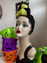 Load image into Gallery viewer, Mannequin head with Halloween makeup and colorful buckets on a white background