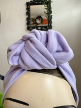 Load image into Gallery viewer, Light purple knotted headscarf on a mannequin head with a blurred background