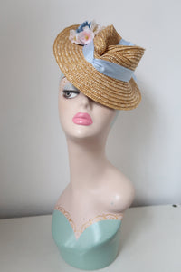 Handmade vintage straw hat with blue trim