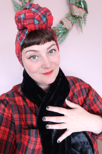 woman wears black faux fur vintage scarf