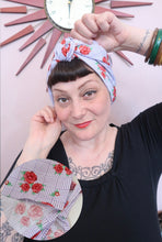 Load image into Gallery viewer, Woman tying a lilac &amp; roses printed 1940s handmade vintage headscarf