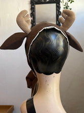 Load image into Gallery viewer, Mannequin head wearing a brown deer costume with festive background