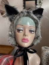 Load image into Gallery viewer, Gray furry werewolf ear headband on a mannequin head with a neutral background
