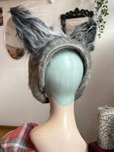 Load image into Gallery viewer, Gray furry werewolf ear headband on a mannequin head with a neutral background