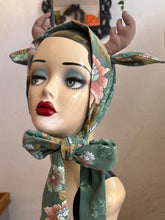 Load image into Gallery viewer, Mannequin head with floral deer antlers surrounded by decorative mushrooms and leaves.