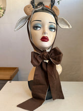 Load image into Gallery viewer, Mannequin head wearing a brown deer costume with festive background