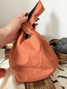 Orange knot bag