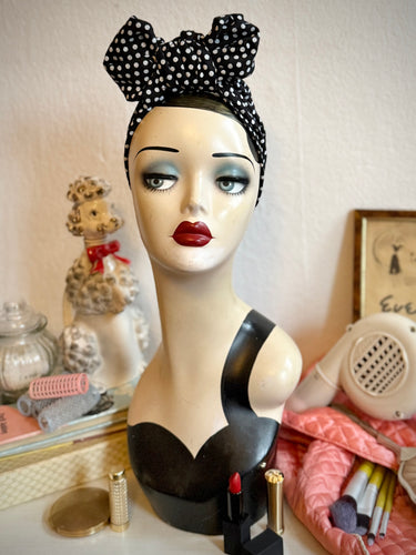 Mannequin head with polka dot headband