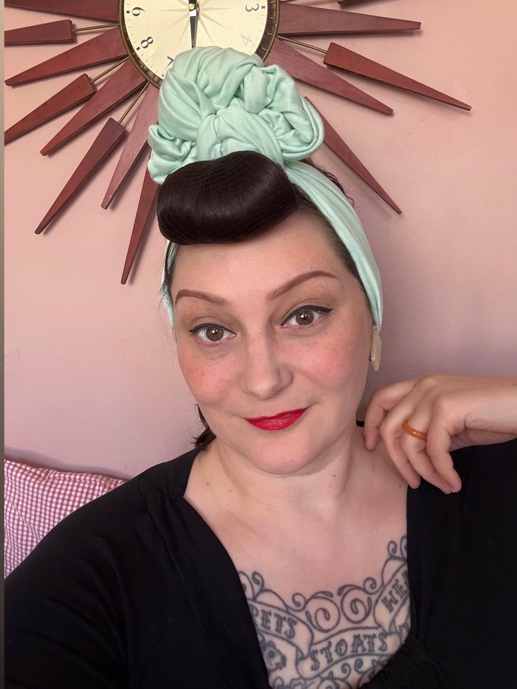 Woman wears mint vintage style headband 