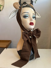 Load image into Gallery viewer, Mannequin head wearing a brown deer costume with festive background