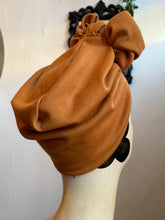 Load image into Gallery viewer, mustard turban on a mannequin head against a neutral background