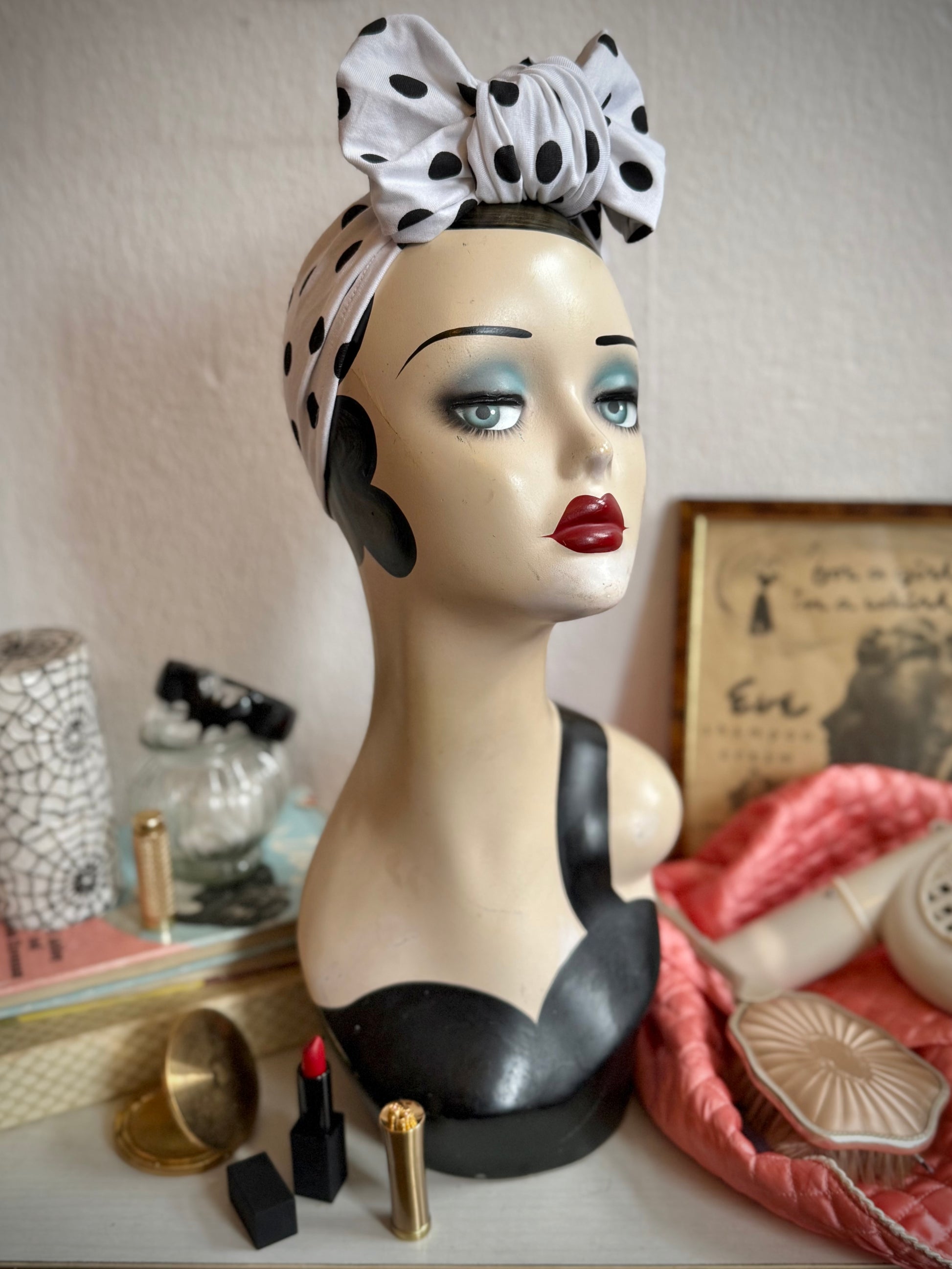 Display head wears vintage polkadot turban