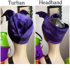 Purple turban and headband displayed on mannequin heads with Halloween-themed buckets in the background.