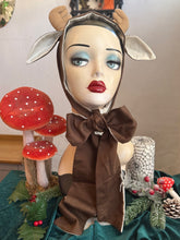Load image into Gallery viewer, Mannequin head wearing a brown deer costume with festive background