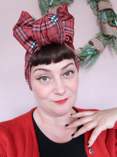 vintage woman wears tartan Christmas headband