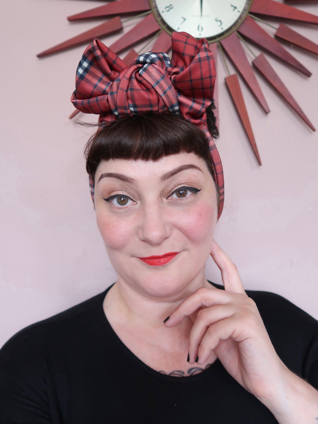 vintage display head, wears tartan headband