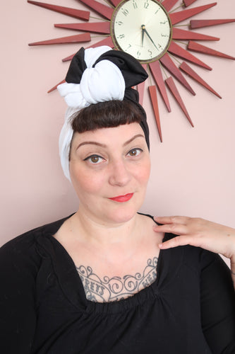 woman wearing black & white vintage turban